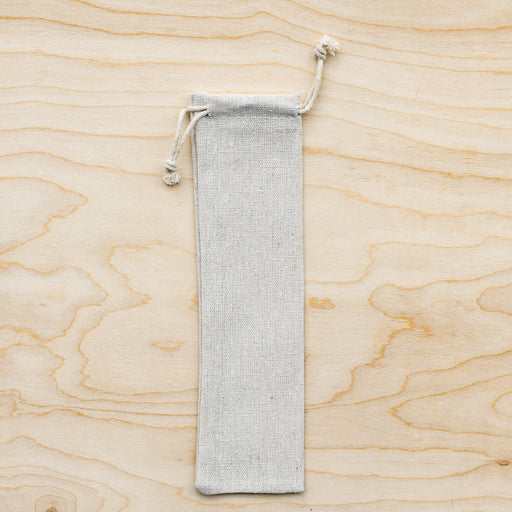 Canvas pouch for straw travel with drawstring closure.