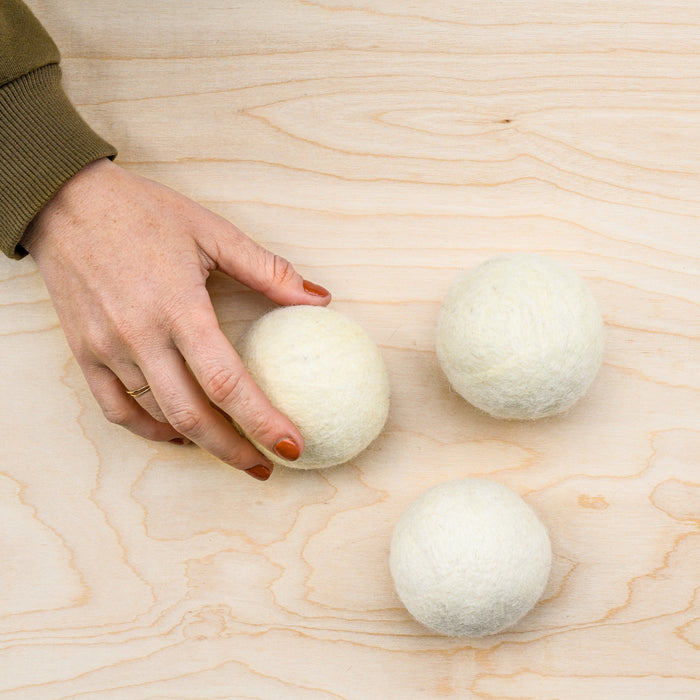 Wool felted natural wool dryer balls. 