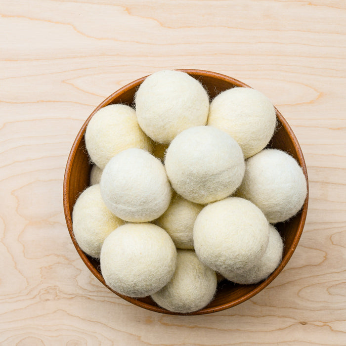 Wool felted natural wool dryer balls.
